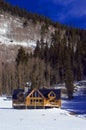 Colorado Mountain Log Home in Snow Royalty Free Stock Photo