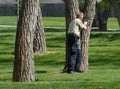 Shooting tranquilizer dart at urban wildlife