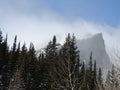 Colorado peaks with snow blowing