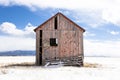 Colorado red barn in snow field Royalty Free Stock Photo