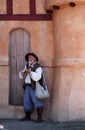 Colorado Renaissance Festival. An actor posing in the costume of medieval bard