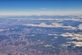 Colorado Rocky Mountains Aerial panoramic views from airplane of abstract Landscapes, peaks, canyons and rural cities in southwest Royalty Free Stock Photo