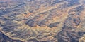 Colorado Rocky Mountains Aerial panoramic views from airplane of abstract Landscapes, peaks, canyons and rural cities in southwest Royalty Free Stock Photo