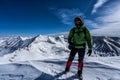 Hiker on a winter summit view from Mt. Buckskin, Colorado Rocky Mountains