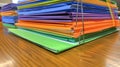 Colorcoded stacks of folders and dividers provide a practical way for students to stay organized and keep track of their