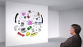 Colored animation showing 3d room and brain having ideas and man watching