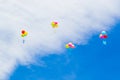 Colored balloons with Bulgarian letters in blue sky