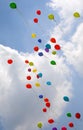 colored balloons fly high in the sky Royalty Free Stock Photo