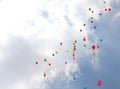 colored balloons fly towards the sky Royalty Free Stock Photo