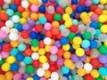 Colored balls. bright background colors. Top view of many colorful balls in the ball pool on the indoor Playground. Texture. Royalty Free Stock Photo