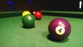 Colored balls for the game on the pool Billiards. The focus in the foreground Royalty Free Stock Photo