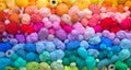 Colored balls and skiens of yarn for knitting. Top view. Rainbow colors. Color horizontal gradient. Royalty Free Stock Photo