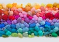 Colored balls and skiens of yarn for knitting. Top view. Rainbow colors. Color horizontal gradient. Royalty Free Stock Photo