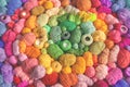 Colored balls and skiens of yarn for knitting. Top view. Rainbow colors. Color radial, round gradient. Royalty Free Stock Photo