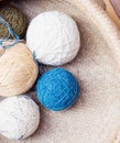 Colored balls of wool on wooden tray, Craft, hobby concept