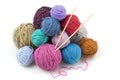 Colored balls of yarn with two knitting needles Royalty Free Stock Photo
