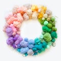 Color wheel of yarn. Rainbow and spectrum. White background. Threads of different colors Royalty Free Stock Photo