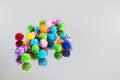 Colored beautiful pompons on a gray background Royalty Free Stock Photo