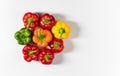 Colored bell peppers on white background. Green, yellow, orange and red pepper. Food concept Royalty Free Stock Photo