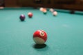 Colored billiard balls on a pool table Royalty Free Stock Photo