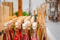 Colored bottles of fragrances with sticks for the fragrance of the house