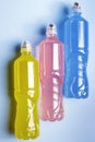 Plastic bottles with colored liquid. Royalty Free Stock Photo