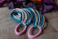 Colored braids made of pink and blue artificial hair
