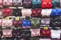 Colored bras on a street market. Fashionable womanswear. Woman underwear