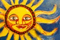 Colored bright sun mural painted on wall in Santa Marta, Colombia Royalty Free Stock Photo