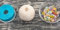 Colored buttons in glass Cup on old wooden Board Royalty Free Stock Photo