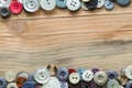 Colored buttons on wooden board, Colorful buttons Royalty Free Stock Photo