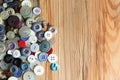 Colored buttons on wooden board, Colorful buttons, on old wooden Royalty Free Stock Photo