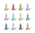 Colored candles in silver candlesticks