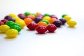 Colorful caramel candy on white background