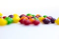 Colorful caramel candy on white background