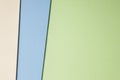 Colored carboards background in beige blue green tone. Copy space.