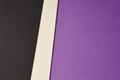 Colored carboards background in black beige purple tone. Copy sp