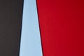 Colored carboards background in black blue red tone. Copy space.