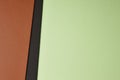 Colored carboards background in brown black green tone.