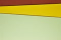 Colored carboards background in green yellow brown tone. Copy sp