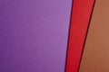 Colored carboards background in purple, red, brown tone. Copy sp