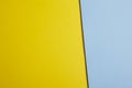 Colored carboards background in yellow and blue tone. Copy space