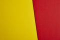 Colored carboards background in yellow and red tone. Copy space