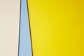 Colored cardboards background in beige blue yellow tone. Copy sp