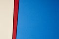 Colored cardboards background beige red blue tone. Copy space