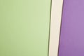 Colored cardboards background in green beige purple tone. Copy s