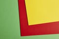 Colored cardboards background in green, red, yellow tone. Copy s