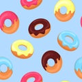 Colored cartoon donuts. Seamless pattern.