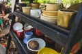 colored ceramic mugs on a wooden shelf Royalty Free Stock Photo