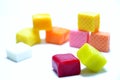 Colored chewing sweets on white background